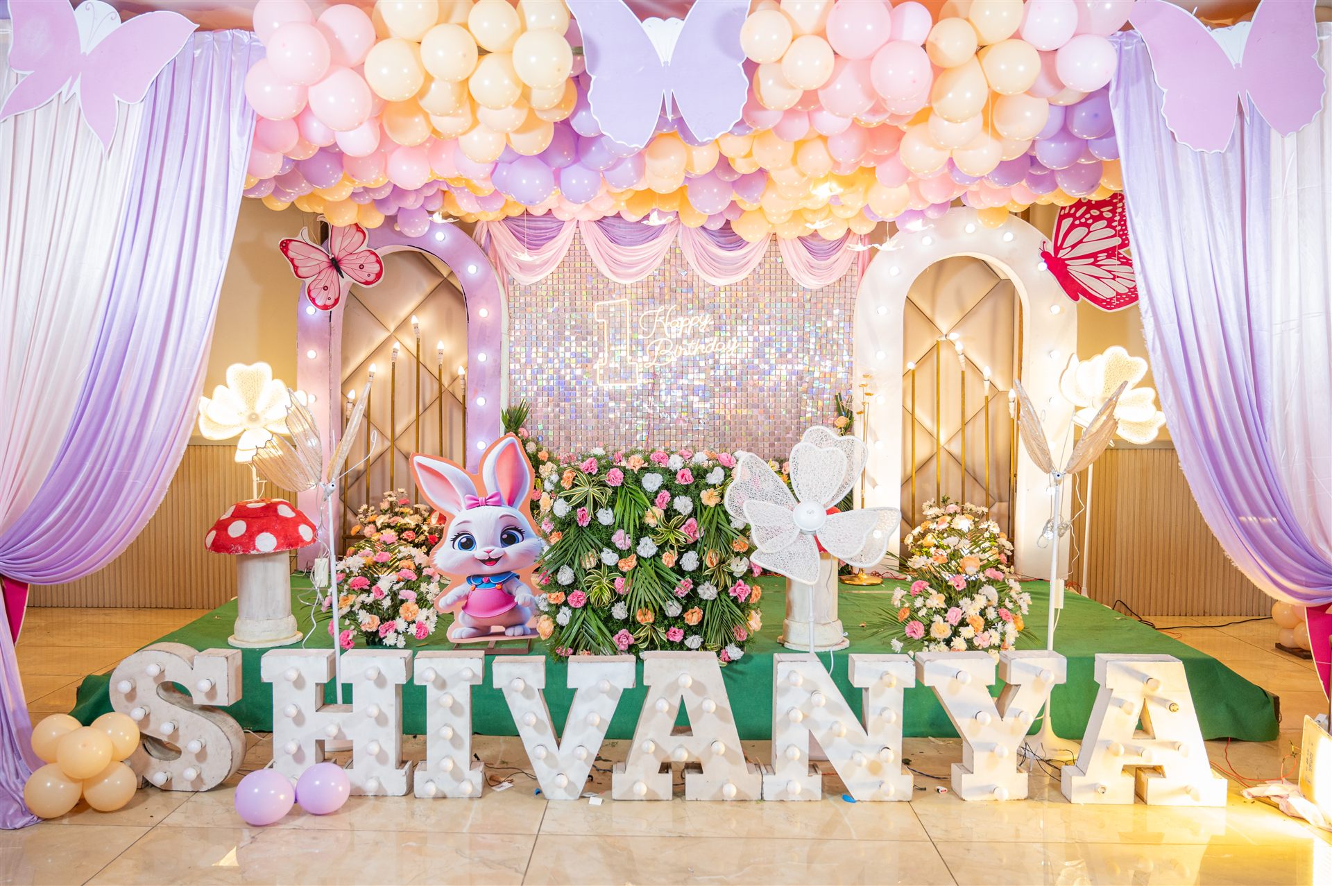 Butterfly and floral birthday theme by Creative Splash event planners